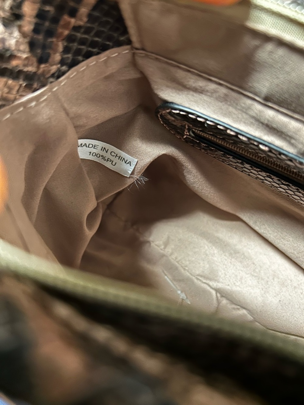 Neutral Beige Lined Handbag Interior with Snake-Print Trim